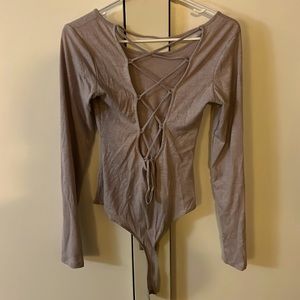 Garage pink bodysuit